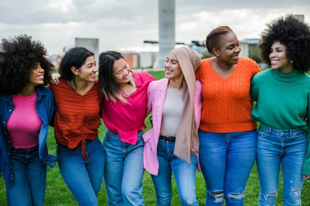 Group of young women from different cultures spending time together Acceptance Path cultural identity