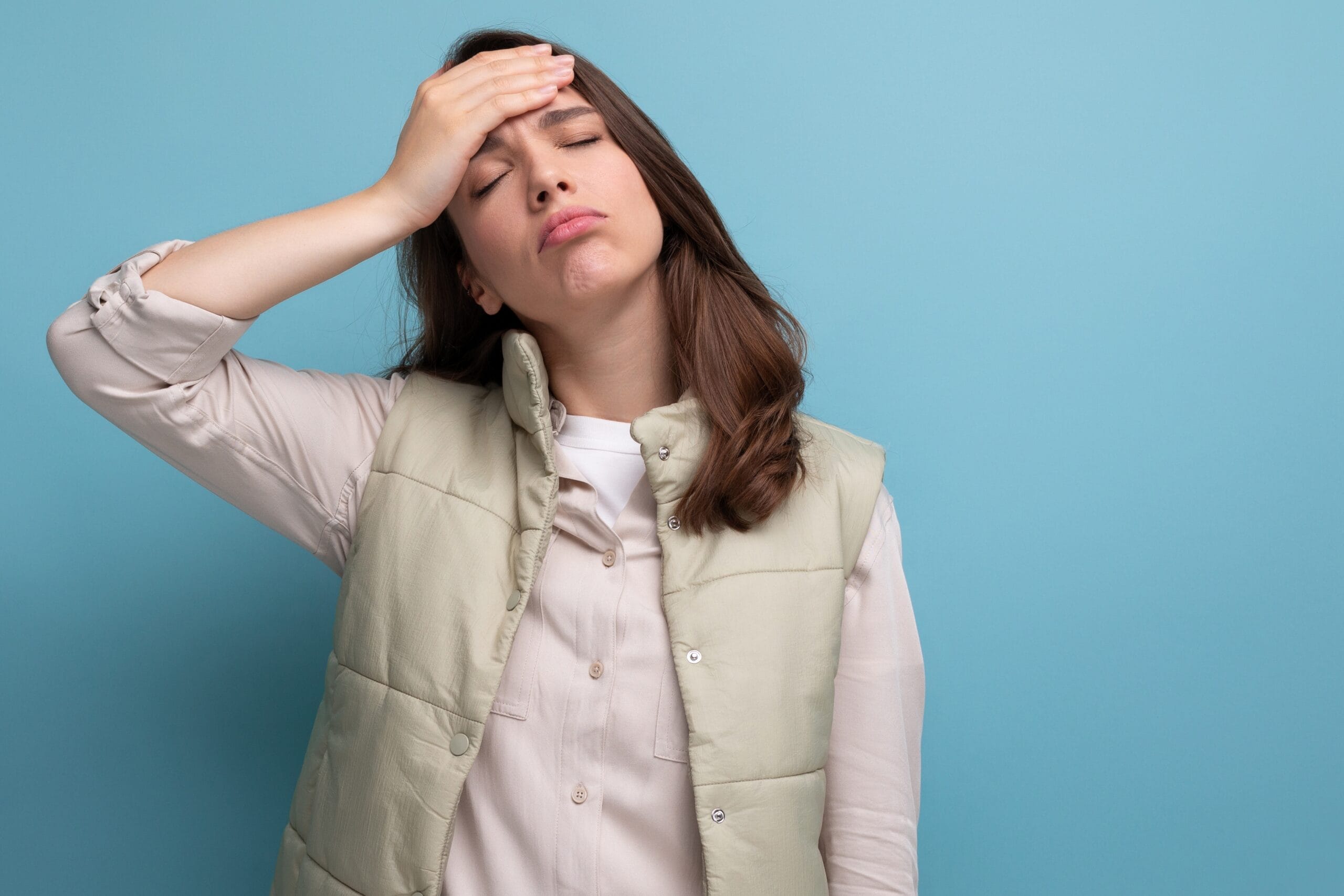 A woman in distress symbolizing the high arousal that leads to an emotional outburst