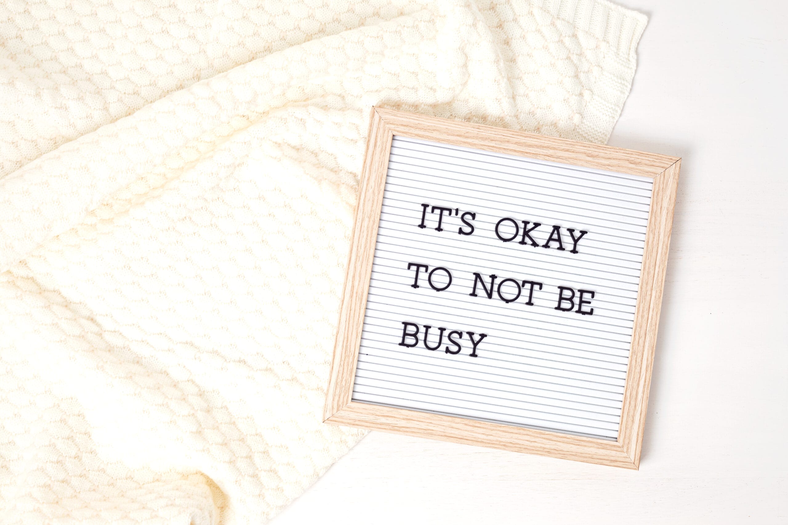 Letterboard 'It's okay to not be busy' for anxiety therapy houston
